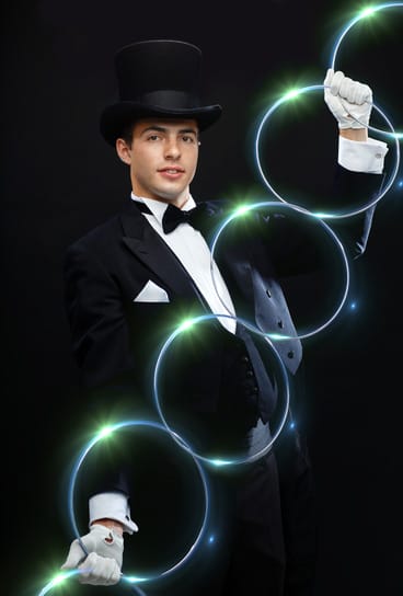 magician showing trick with linking rings
